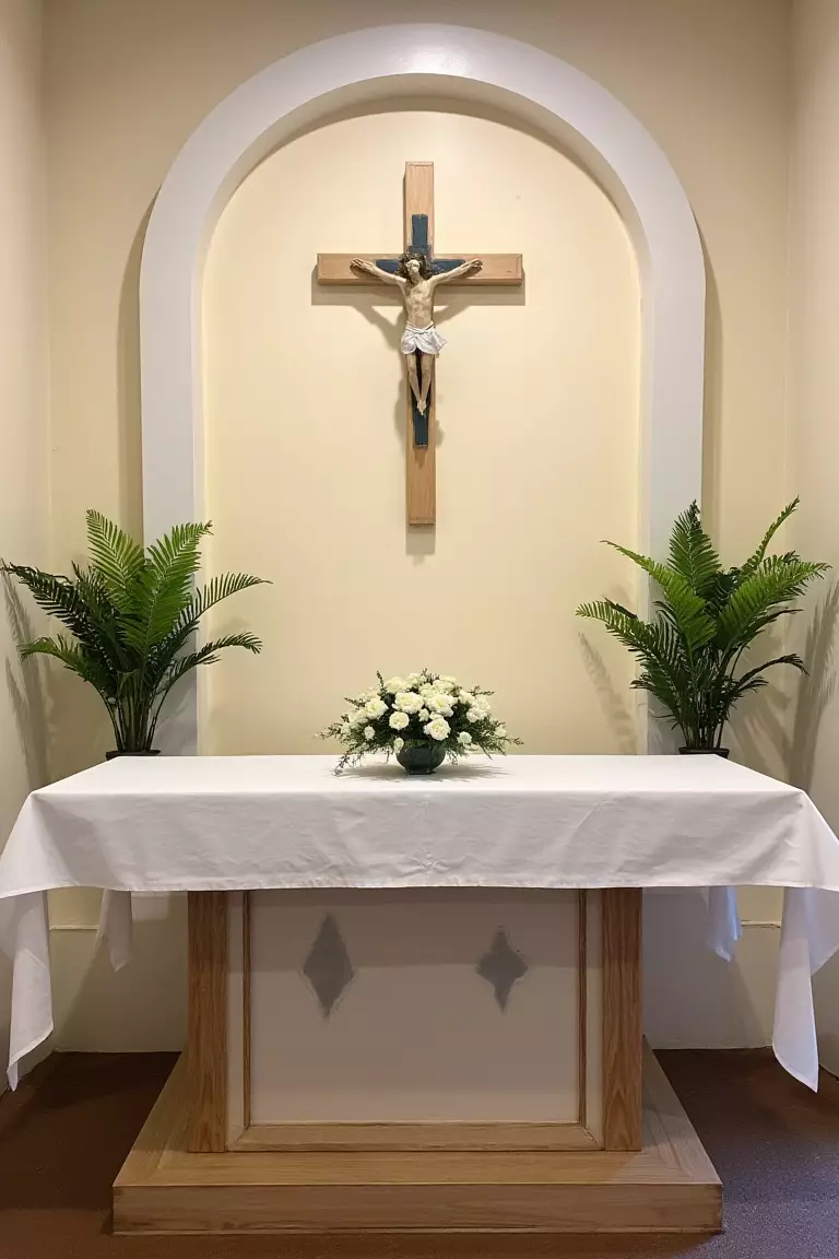 Ferns and Flowers A photo of a simple church altar decorated with a small white flower arrangement and two potted ferns