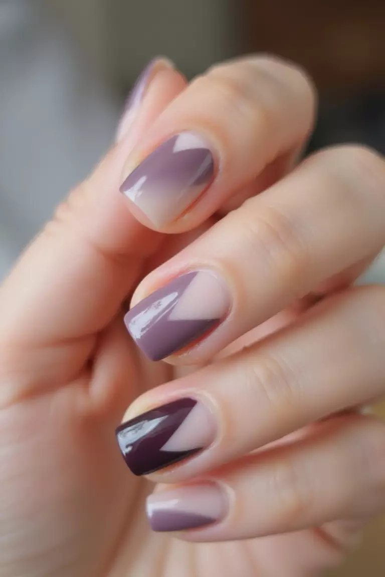 Alternating Colors Close-up of a woman's hand with five fingers featuring short nails with alternating colors, showing two complementary wedding-appropriate shades arranged in a pattern.