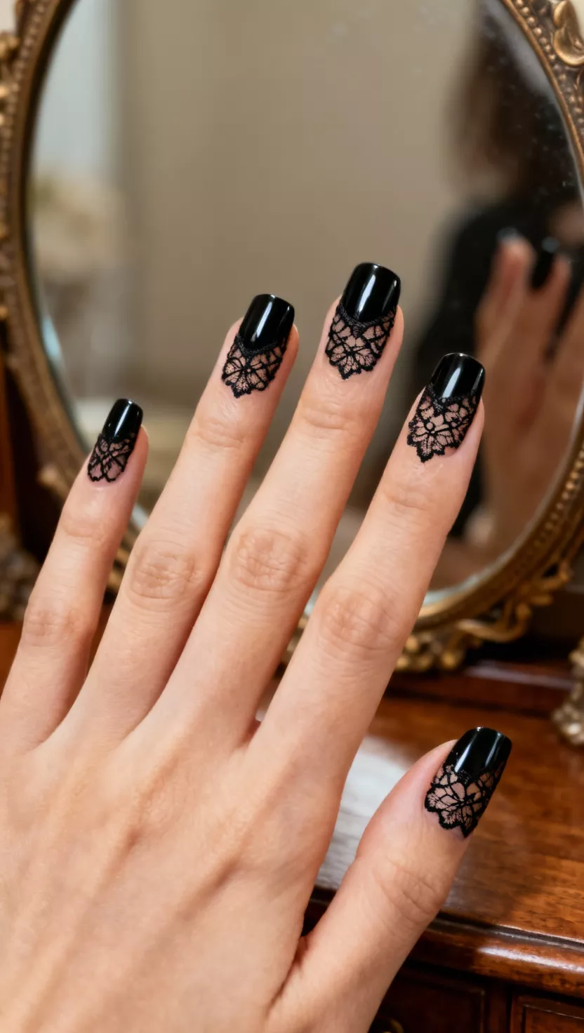 close-up shot of a woman’s hand with five fingers showing nails with a glossy black base adorned with delicate, intricate black lace decals or stamping over the entire nail surface, antique dressing table background.