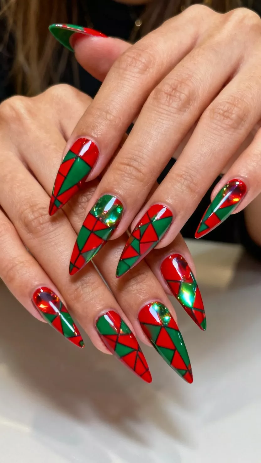 close-up shot of a woman’s hand showing nails with long and sharply pointed nails featuring a striking geometric pattern in red and green with reflective accents, close-up nail photography, nail polish designs, pinterest aesthetic