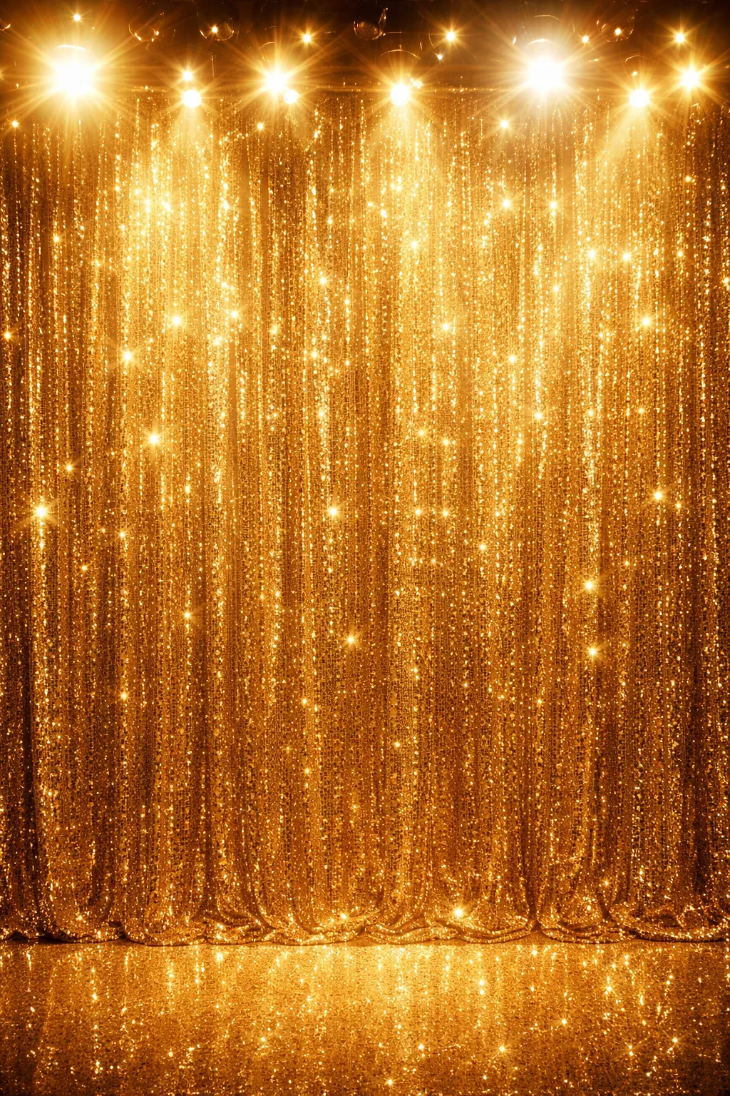 A realistic photo of a shimmering gold sequin curtain backdrop with bright stage lights reflecting off the surface.