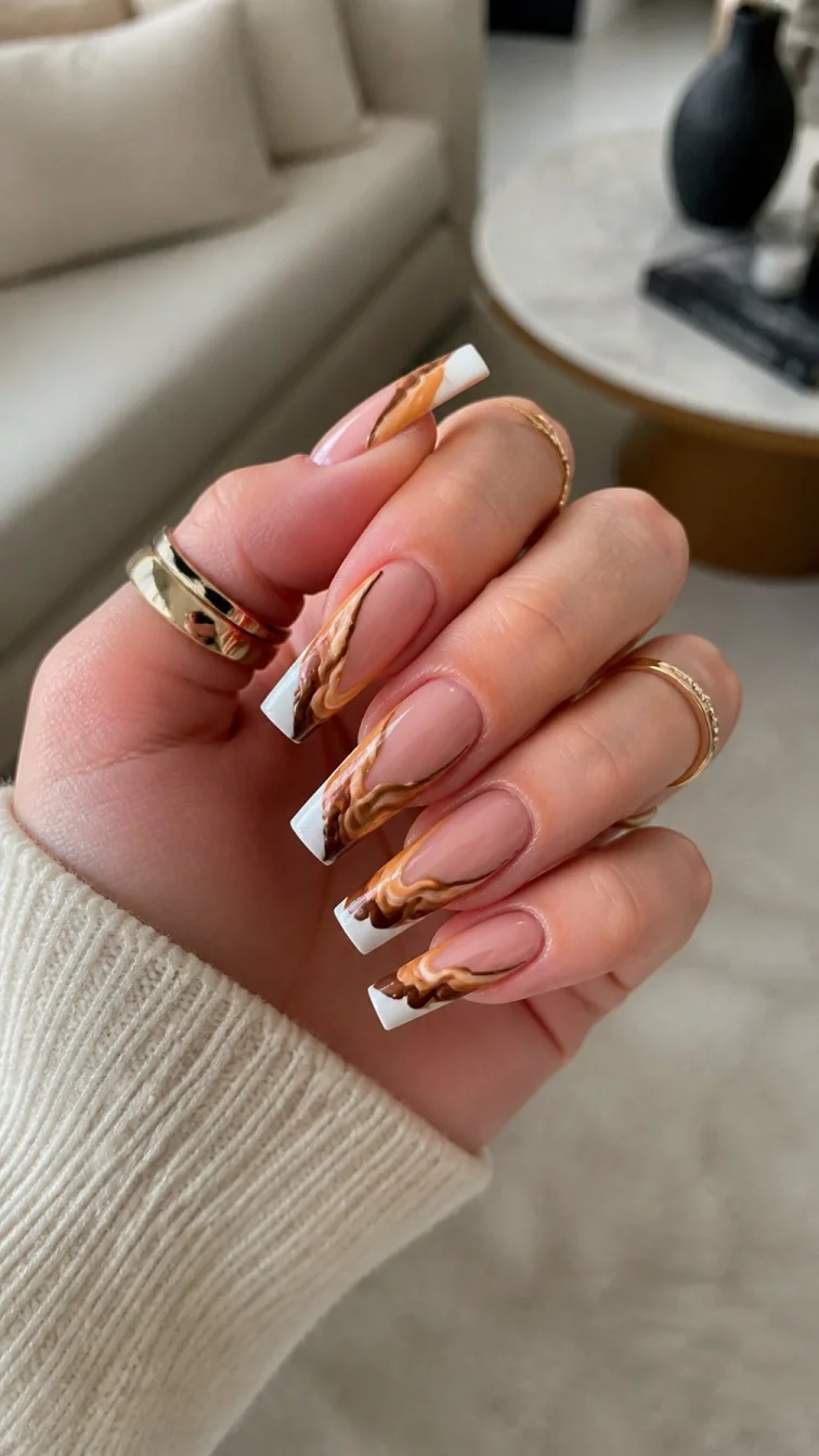 Caramel Wave Frenchies A photorealistic close-up shot of a woman's fair skin tone hand with five fingers, showcasing coffin-shaped long nails featuring French tips, featuring a unique, wavy, textured design in various caramel tones, living room background